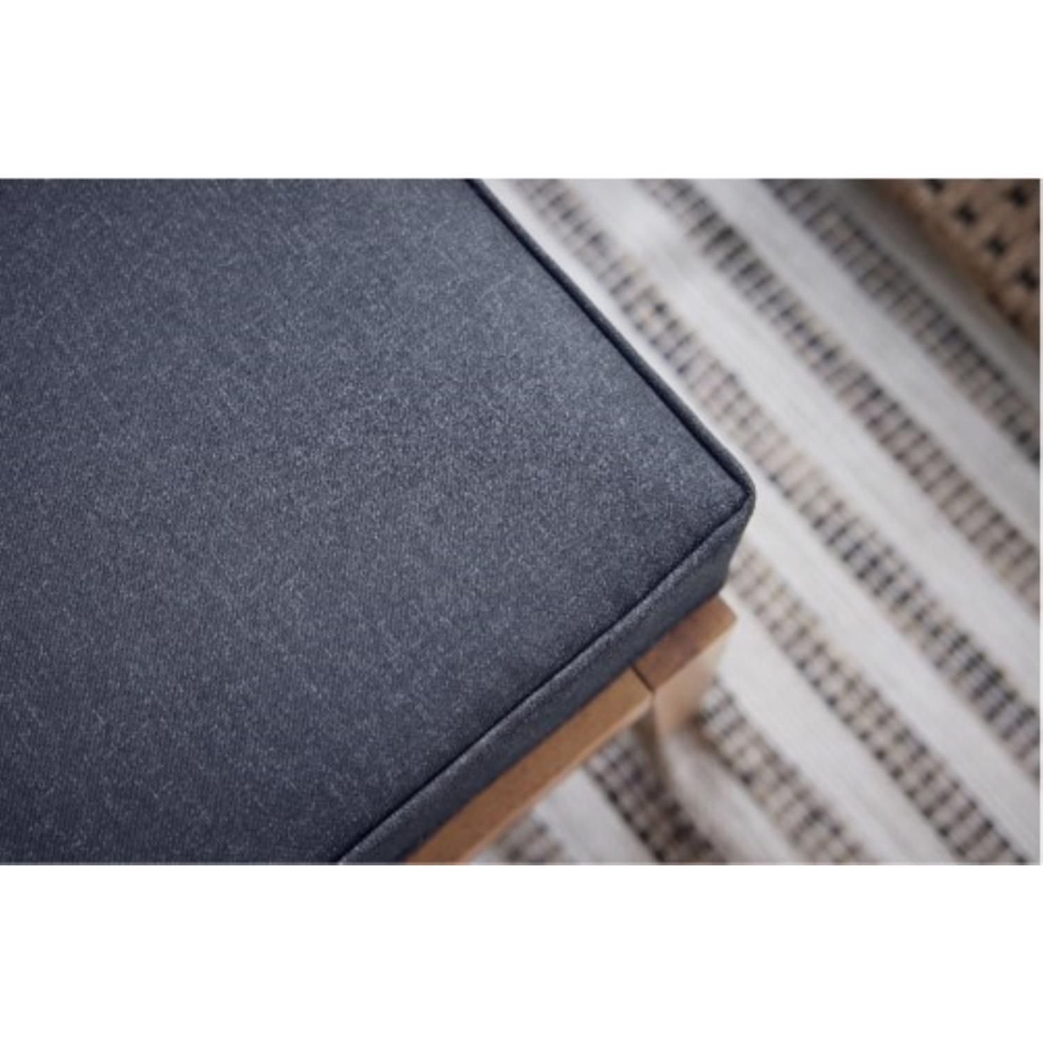 Close-up of navy cushion fabric on outdoor furniture