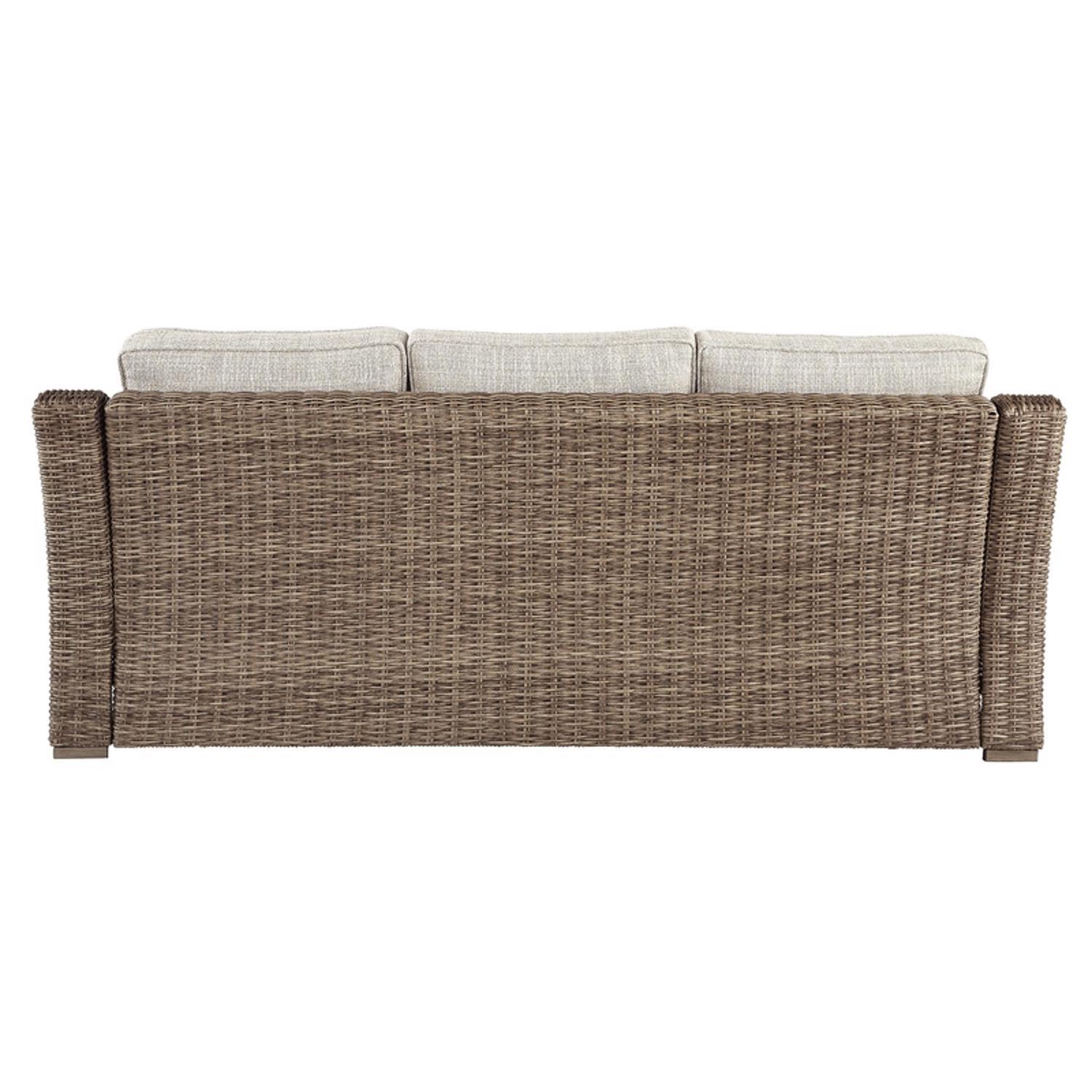 Rear view of outdoor wicker sofa with cushions