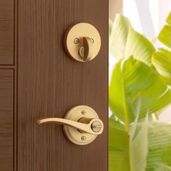Kwikset Sedona Transitional Satin Brass Lever and Single Cylinder Deadbolt KW1 1-3/4 in.