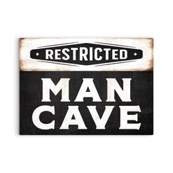 P Graham Dunn 12 in. H X 16 in. L Multicolored Metal Man Cave Sign