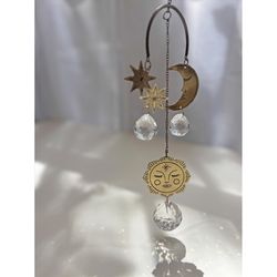 Matr Boomie Antique Gold Glass/Metal 0.25 in. H X 8.75 in. L X 3.75 in. W Engraved Moon/Sun Mobile