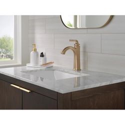 Delta Knoxville Bronzed Gold Contemporary Single-Handle Bathroom Sink Faucet 4 in.