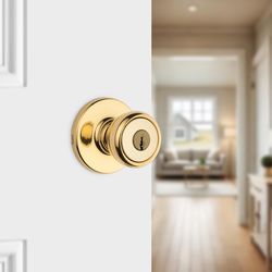Kwikset Tylo Polished Brass Entry Door Knob 1-3/4 in.