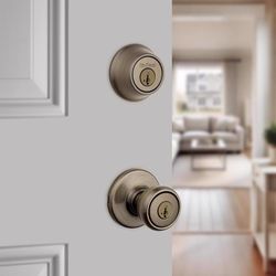 Kwikset Tylo Antique Brass Deadbolt and Entry Door Knob 1-3/4 in.