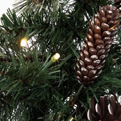 Celebrations 12 in. D X 9 ft. L LED Prelit Twig Pine Bow Garland