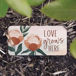 P Graham Dunn Multicolored Faux Marble 4 in. H X 8 in. L X 1 in. W Love Grows Here Stepping Stone