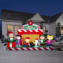 Gemmy Airblown Giant Christmas Inflatable Peanuts Gang Christmas Stage Scene 86 in. Inflatable