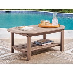 Signature Design by Ashley Cliffs Beach Brown Oval HDPE Contemporary Coffee Table